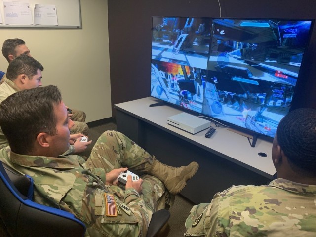 Soldiers play a video game together at the Soldier Recovery Unit in Fort Hood, Texas. (Photo via Maj. Mark Mateja)