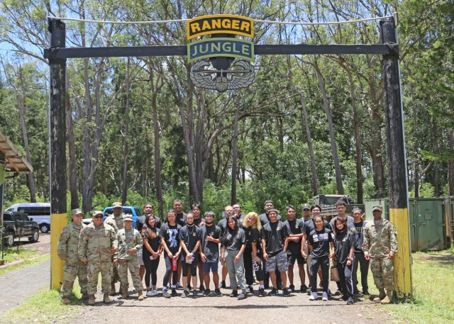 Future Soldiers with the Hawaii Recruiting Company pose for a photo as part of the 25th Infantry Division hosted Army National Hiring Days 2021 event on Schofield Barracks, Hawaii, June 7, 2021 The Future Soldiers and applicants executed physical readiness training with 3rd Infantry Brigade Team, ate at the 25th Division Sustainment Brigade Bistro, observed an M119 Howitzer Fire Drill by 25th DIVARTY, visited an M4 range ran by 2nd Infantry Brigade Combat Team, watched a rappel demonstration at Lightning Academy, operated 25th Combat Aviation Brigade's helicopter simulators, attended the Division's weekly patching ceremony and executed an Oath of Enlistment Ceremony. 

(U.S. Army photo by Master Sgt. Andrew Porch, 25th Inf. Div.)