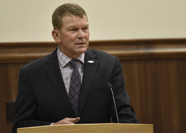 Retired Lt. Gen. Jeffrey Buchanan speaks at U.S. Army Military Police School Commandant Brig. Gen. Niave Knell&#39;s promotion ceremony June 4 at Lincoln Hall Auditorium. Buchanan worked with Knell at U.S. Army North, when he was director of...