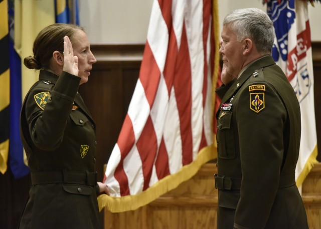 Maj. Gen. James Bonner, Maneuver Support Center of Excellence and Fort Leonard Wood commanding general, conducts the reaffirmation of oath with Brig. Gen. Niave Knell, U.S. Army Military Police School commandant, during Knell&#39;s promotion...
