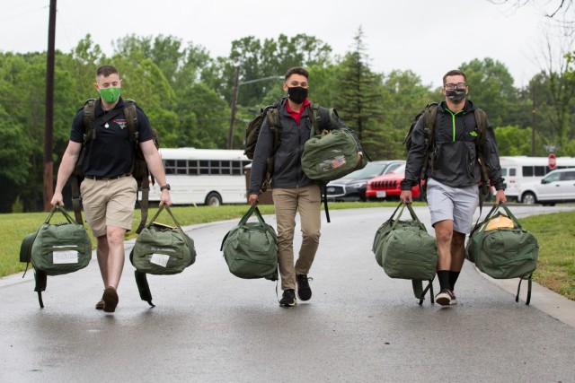 Cadet Sawyer Biven, left, Jonathan Amaya, and Pual Kotarski arrive for 3rd Regiment, Advanced Camp, Fort Knox, Ky., June 2, 2021. All three Cadets are from the University of Louisville. Once Cadets arrive for Cadet Summer Training they will begin...