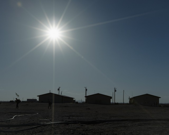 The late-morning sun shines over the tactical operations center at Camp Old Ironsides, Fort Bliss, Texas, June 6, 2021.