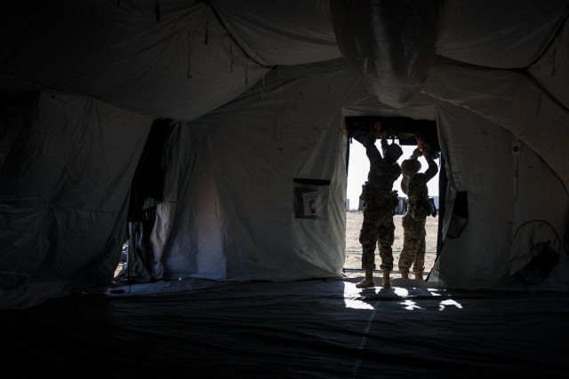 Soldiers from the 131st Field Hospital stand up one of almost 20 Expeditionary Medical Support System structures as part of field exercise Operation Guardian Readiness at Fort Bliss, Texas, June 5, 2021.In April 2018, the 131st FH (then the 31st was the second active-duty unit in the Army to field the EMEDS.