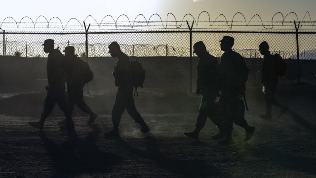 Soldiers from the 131st Field Hospital arrive just after sunrise at Camp Old Ironsides, Fort Bliss, Texas, June 6, 2021. During field exercise Operation Guardian Readiness, 131st FH Soldiers built proficiency in their ability to stand up their...