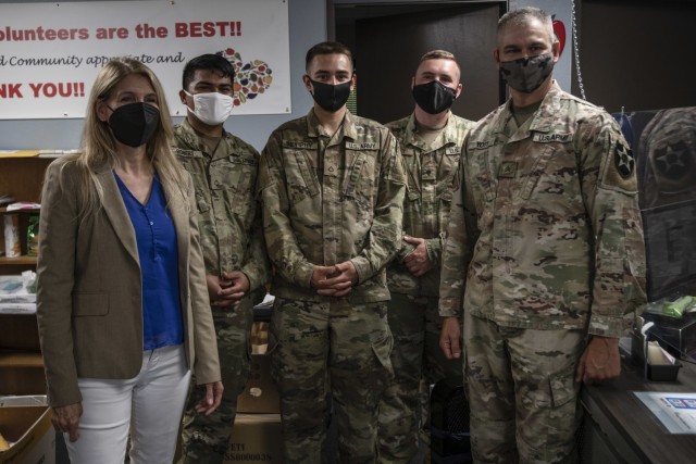 U.S. Army Soldiers with Joint Task Force Steelhead, the Washington National Guard’s COVID-19 response force, pose for a photo with Washington State House Rep. Tina Orwall at the Kent Food Bank, June 22, 2021, in Kent, Wash. The Washington...