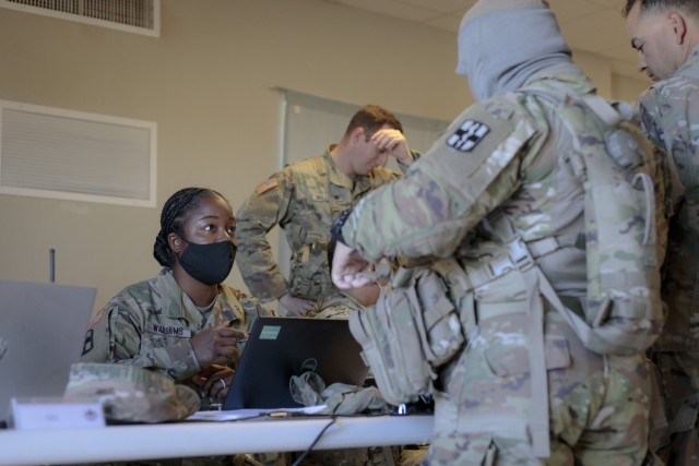 Staff Sgt. Petagay Williams, the 131st FH’s acting administration officer, or S-1 officer-in-charge, in the 131st Field Hospital tactical operations center at Camp Old Ironsides, Fort Bliss, Texas, June 6, 2021.