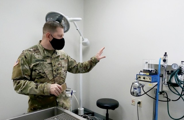 Sgt. Clayton L. Gerrion, an animal care noncommissioned officer at the Fort Shafter Veterinary Activity, directs a tour of the dental suite while describing the process of obtaining American Animal Hospital Association accreditation, May 19.  For...