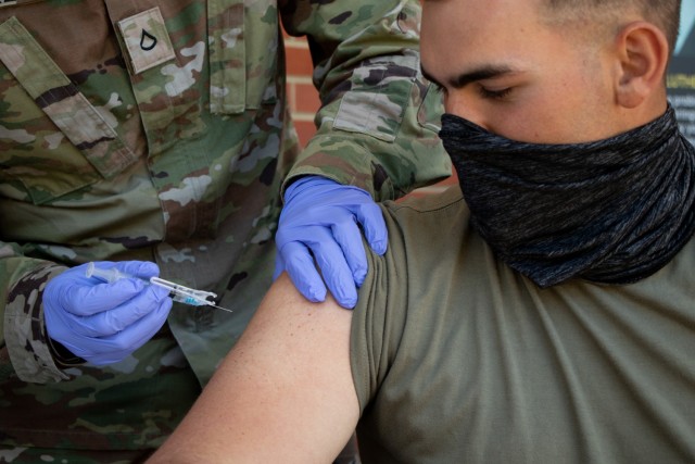 Cadet Brent Adcock, 2nd Regiment, Advanced Camp, Texas A&M University, voluntarily receives the Johnson & Johnson COVID-19 vaccine, Fort Knox, Ky., May 30, 2021. Cadet Summer Training has the resources to offer Cadets the vaccine on a voluntary basis. 