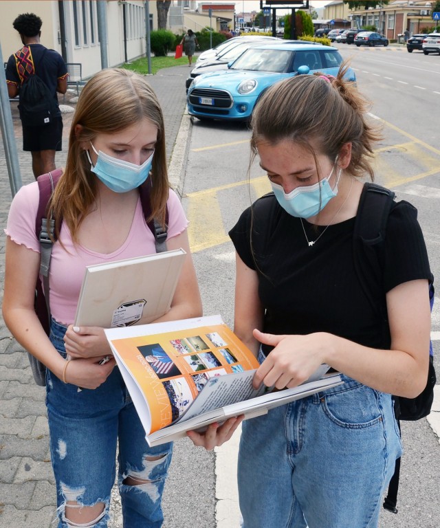 VICENZA, Italy - Vicenza High School students look at their yearly book after leaving school the last day June 10, 2021.
...