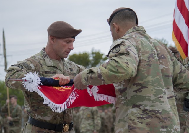 Brig. Gen. Charles Masaracchia, the 3rd Security Force Assistance Brigade (SFAB) commander, and Command Sgt. Maj. Raymond Harris, the 3rd SFAB command sergeant major, case the brigade colors on Fort Hood, Oct. 17, 2019. The casing ceremony was held as the unit prepares to leave for their rotation in U.S. Central Command (CENTCOM). 