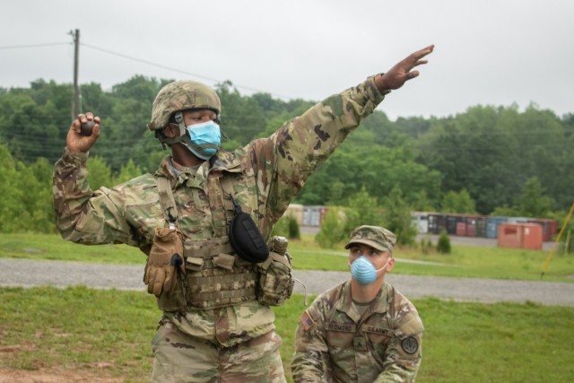 Cadet Ricarlis Marshall, 3rd Regiment, Advanced Camp, Mississippi State University, throws a practice hand grenade, Fort Knox, Ky., June 9, 2021. The hand grenade training exercise is one of the very last events prior to Cadets leaving the 10-day monitoring period for COVID-19. 