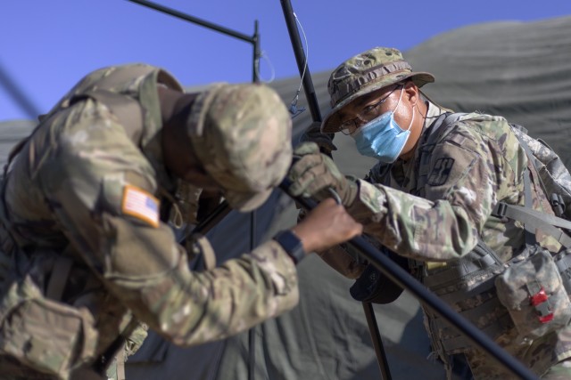Soldiers from the 131st Field Hospital stood up one of almost 20 Expeditionary Medical Support System structures as part of field exercise Operation Guardian Readiness at Fort Bliss, Texas, June 5, 2021. In April 2018, the 131st FH (then the 31st...