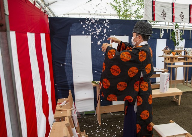 Leadership from the U.S. Army Corps of Engineers, 374th Airlift Wing, and NIPPO Corp. gather for a “Jichinsai” or "land-appeasing ceremony" during a groundbreaking, June 4 at Yokota Air Base. This is an ancient Japanese ceremony is held before the commencement of the AFSOC CV-22 Osprey Facility Simulator project - a critical build for the U.S. Japan Alliance and the region. The priests will pray for the prosperity of the owner and occupants of the building once the simulator comes to fruition. (Photo by Luis Casale)