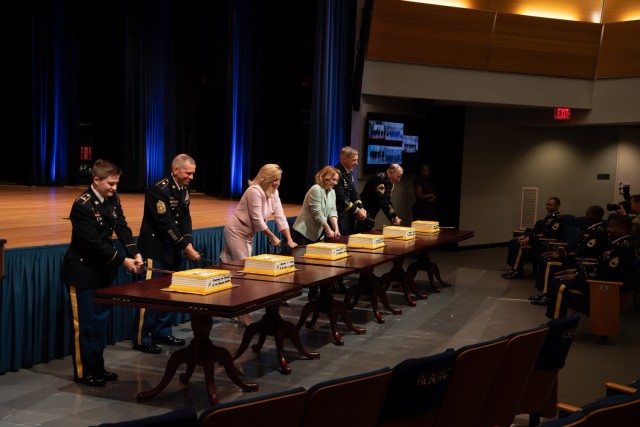 Secretary of the Army Christine E. Wormuth, Army Chief of Staff Gen. James C. McConville, and Sgt. Maj. of the Army Michael A. Grinston celebrate the Army&#39;s 246th birthday by hosting a mass reenlistment ceremony and cake cutting at the...