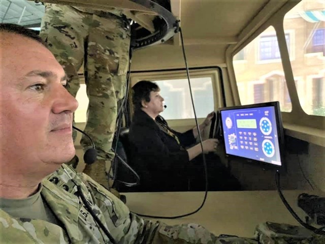 Brenda Lee McCullough, director of Installation Management Command (IMCOM)-Readiness, and Garrison Commander Col. Michael Poss participate in a simulations training scenario June 8, 2021, at a simulations training facility at Fort McCoy, Wis....