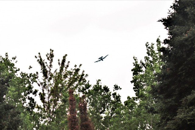 An A-10 Thunderbolt II flies in an area near Tomah, Wis., on May 21, 2021. The aircraft was flying a mission that took it to Fort McCoy, Wis. Members of the 354th Fighter Squadron and 355th Operations Support Squadron controllers from...