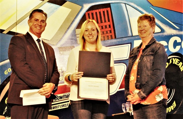 Kate Sharp (center) is recognized May 25, 2021, by Directorate of Family and Morale, Welfare and Recreation (DFMWR) Director Patric McGuane for outstanding performance, dedication to duty, and professionalism during a DFMWR stand down event at...