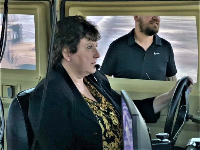 Brenda Lee McCullough, director of Installation Management Command (IMCOM)-Readiness, participates in a simulations training scenario June 8, 2021, at a simulations training facility at Fort McCoy, Wis. McCullough and Command Sgt. Maj. Dan...