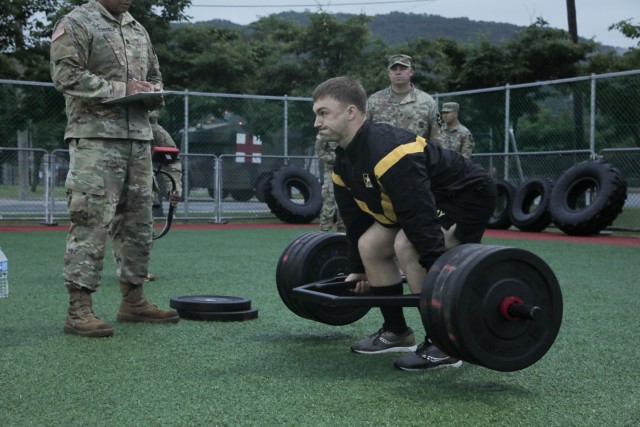 Spc. Seth Piotti, a Combat Engineer assigned to 2nd Infantry Division, Eighth Army, preforms the Dead Lift exercise for the Army Combat Fitness Test during the United States Army Pacific Best Warrior Competition 2021 at Camp Casey, South Korea on June 4, 2021. The USARPAC BWC 2021 is an annual week-long competition consisting of competitors from multiple USARPAC units. This year, due to COVID-19, the competition will take place across the Indo-Pacific with competitors conducting physical events at their home station and participating in a virtual knowledge board presided by the USARPAC Command Sergeant Major.  The noncommissioned officers and junior enlisted Soldiers are evaluated in several categories such as general military knowledge, basic Soldier skills, and physical fitness.