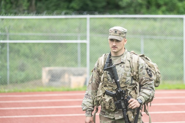 Spc. Seth Piotti, a Combat Engineer assigned to 2nd Infantry Division, Eighth Army, stands by to compete in the Warrior Tasks and Battle Drills lane during the United States Army Pacific Best Warrior Competition 2021 at Camp Casey, South Korea on June 3, 2021. The USARPAC BWC 2021 is an annual week-long competition consisting of competitors from multiple USARPAC units. This year, due to COVID-19, the competition will take place across the Indo-Pacific with competitors conducting physical events at their home station and participating in a virtual knowledge board presided by the USARPAC Command Sergeant Major.  The noncommissioned officers and junior enlisted Soldiers are evaluated in several categories such as general military knowledge, basic Soldier skills, and physical fitness.