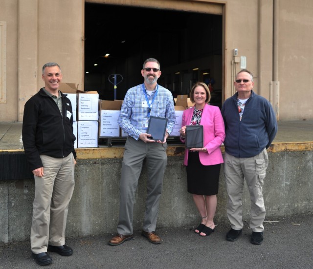 From student to donor: 446th AW member orchestrates nearly 100 iPads for local elementary school