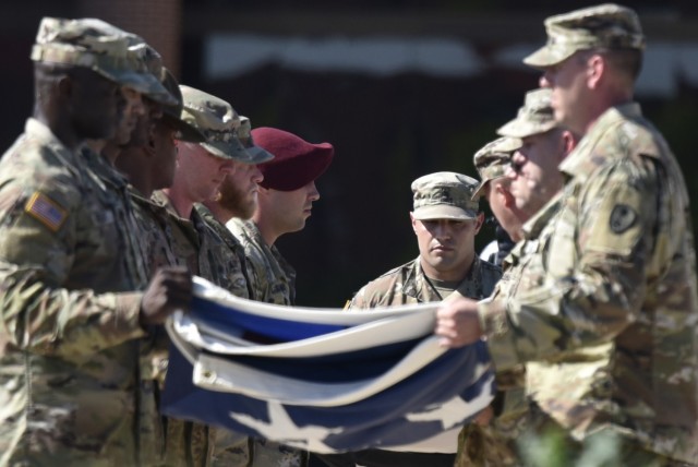 Soldiers from the Noncommissioned Officers Academy perform a Retreat Ceremony June 14 on MSCoE Plaza.