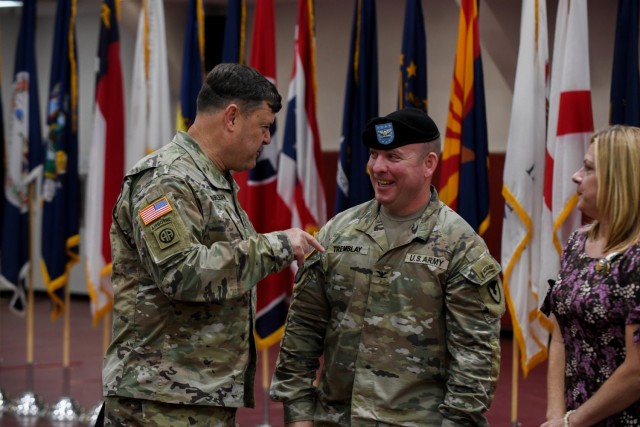 CAMP HUMPHREYS, Republic of Korea - Lt. Gen. Willard M. Burleson III, left, the commanding general of Eighth Army, speaks with and bids farewell to Col. Michael F. Tremblay, the outgoing garrison commander for United States Army Garrison Humphreys, after a change of command ceremony here, June 15. Tremblay&#39;s effective communication and leadership helped to strengthen community ties as well as introduce and maintain strong COVID-19 mitigation measures in the community.