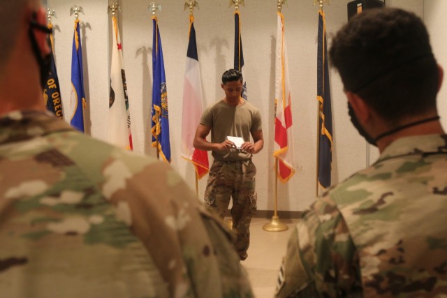 U.S. Army Spc. Jasper Aragon, a medic from Downey, California, assigned to 1st Battalion, 28th Infantry Regiment “Black Lions,” 3rd Infantry Division, teaches Soldiers how to call in a 9-line medical evacuation request during combat lifesaver training on Camp Fuji, Japan, June 15, 2021. The Black Lions are in Japan to take part in Exercise Orient Shield 21-2, which begins later this month. Orient Shield is the largest U.S. Army and Japan Ground Self-Defense Force bilateral field training exercise being executed in various locations throughout Japan to enhance interoperability and test and refine multi-domain and cross-domain operations.