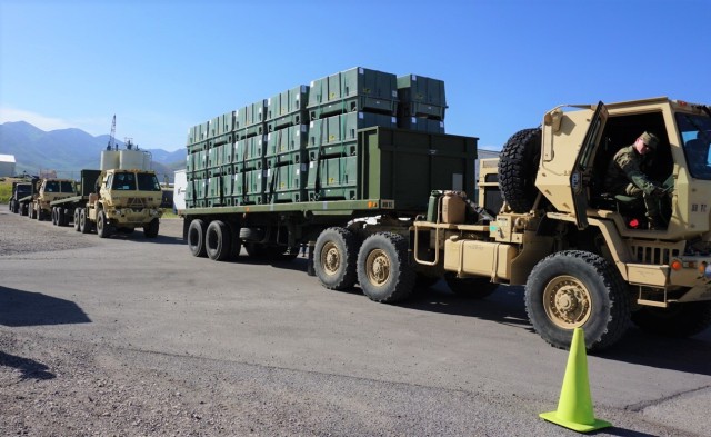 Army Transportation Trucks in a line