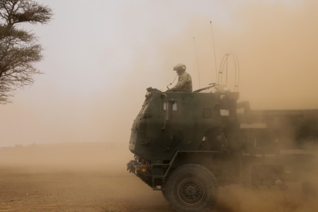 A High Mobility Artillery Rocket System crew assigned to Alpha Battery, 1st Battalion, 77th Field Artillery Regiment, 41st Field Artillery Brigade, conducts crew drills prior to the live-fire exercise during African Lion 2021, at Guirer Libouihi Air Base, on June 8, 2021. The 41st FAB is conducting a suppression of enemy air defense in support of an Airborne joint Forcible Entry during African Lion 2021. This dynamic force employment exercise is their fourth exercise in the Fires Shock series, and a sub-exercise of U.S. Army Europe and Africa’s Defender 21. African Lion 2021 is U.S. Africa Command’s largest, premier, joint, annual exercise hosted by Morocco, Tunisia, and Senegal, 7-18 June. More than 7,000 participants from nine nations and NATO train together with a focus on enhancing readiness for U.S. and partner nation forces. AL21 is a multi-domain, multi-component, and multinational exercise, which employs a full array of mission capabilities with the goal to strengthen interoperability among participants. (U.S. Army photo by Spc. Zack Stahlberg)