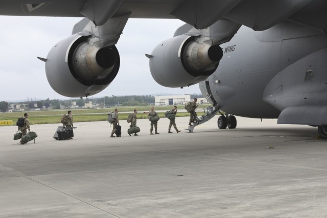 U.S. Army Soldiers assigned to Alpha Battery, 1st Battalion, 77th Field Artillery Regiment, 41st Field Artillery Brigade, load onto a C-17 Globemaster III aircraft for African Lion 2021 in Morocco, at Ramstein Air Base, on June 7, 2021. The 41st FAB is conducting a suppression of enemy air defense in support of an Airborne joint Forcible Entry during African Lion 2021. This dynamic force employment exercise is their fourth exercise in the Fires Shock series, and a sub-exercise of U.S. Army Europe and Africa’s Defender 21. African Lion 2021 is U.S. Africa Command’s largest, premier, joint, annual exercise hosted by Morocco, Tunisia, and Senegal, 7-18 June. More than 7,000 participants from nine nations and NATO train together with a focus on enhancing readiness for U.S. and partner nation forces. AL21 is a multi-domain, multi-component, and multinational exercise, which employs a full array of mission capabilities with the goal to strengthen interoperability among participants. (U.S. Army photo by Spc. Zack Stahlberg)