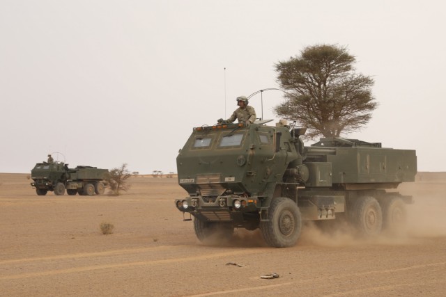 A High Mobility Artillery Rocket System crew assigned to Alpha Battery, 1st Battalion, 77th Field Artillery Regiment, 41st Field Artillery Brigade, conducts crew drills prior to the live-fire exercise during African Lion 2021, at Guirer Libouihi Air Base, on June 8, 2021. The 41st FAB is conducting a suppression of enemy air defense in support of an Airborne joint Forcible Entry during African Lion 2021. This dynamic force employment exercise is their fourth exercise in the Fires Shock series, and a sub-exercise of U.S. Army Europe and Africa’s Defender 21. African Lion 2021 is U.S. Africa Command’s largest, premier, joint, annual exercise hosted by Morocco, Tunisia, and Senegal, 7-18 June. More than 7,000 participants from nine nations and NATO train together with a focus on enhancing readiness for U.S. and partner nation forces. AL21 is a multi-domain, multi-component, and multinational exercise, which employs a full array of mission capabilities with the goal to strengthen interoperability among participants. (U.S. Army photo by Spc. Zack Stahlberg)