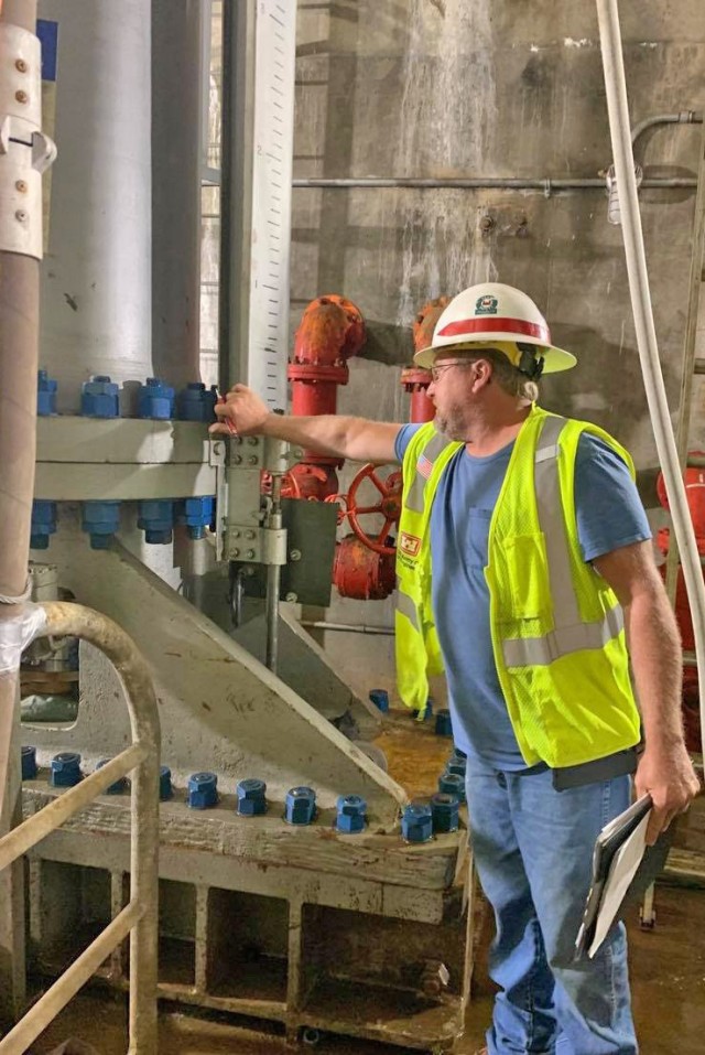 Pine Creek Lake mainenance person, Jerry Dewitt ensures all lockout tagout procedures are followed in conjunction with the bulkhead dive on June 12.