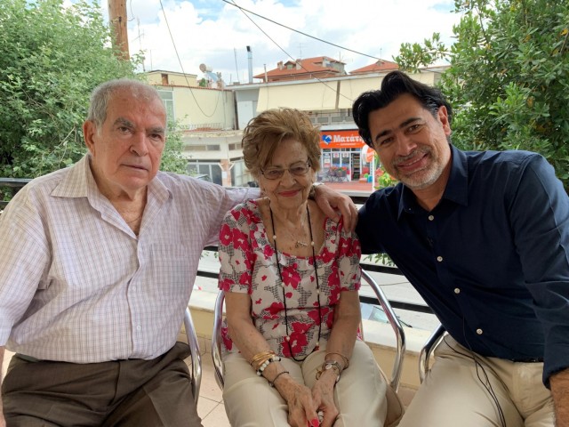 Michael Pittas,  with his mother and father, Susana and Panos, at their home near Thessaloniki, Greece.  Panos and Michael have both served as host-national transportation professionals with the U.S. Army in Greece. Between father and son, they have more than 60-years of service with our Army Team.
