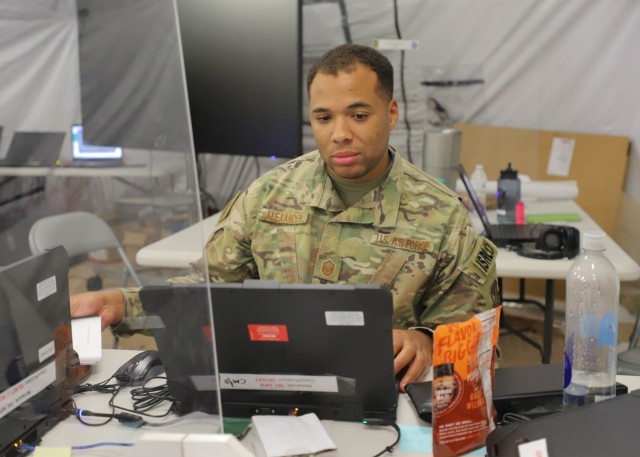 A U.S. Air Force master sergeant works at his computer during the Defender Europe 21 command post exercise, June 10, 2021, on Fort Knox Kentucky. The CPX was another step in the Victory Corps march to full operational capability and becoming a certified warfighting headquarters.