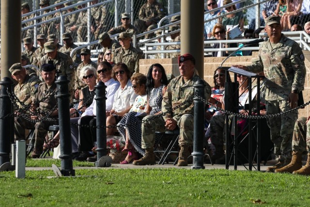 U.S. Army Maj. Gen. Antonio A. Aguto, right, gives his final remarks as 3rd Infantry Division commander during a Change of Command Ceremony, June 21, 2021. Lt. Gen. Michael Kurilla, center, commanding general of the XVIII Corps, presided over the ceremony. Aguto relinquished command to the incoming, 3rd Infantry Division Commander, Maj. Gen. Charles D. Costanza. (U.S. Army Photo by Pfc. Caitlin Wilkins, 50th Public Affairs Detachment)