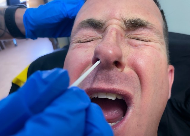 Staff Sgt. Christopher Jackson, Mass Communications Specialist assigned to 221st Public Affairs Detachment, 7th Mission Support Command is swabbed for COVID 19 testing during DEFENDER-Europe 21 at Kucove, Albania, May 19, 2021. Approximately 800...