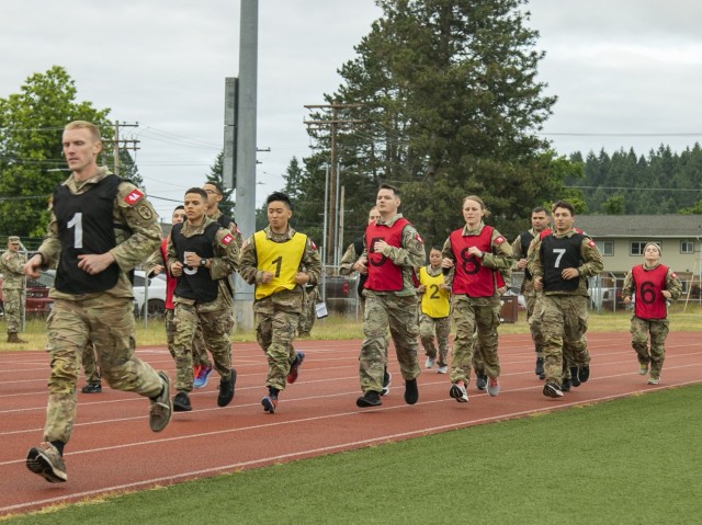 Participants in the Regional Health Command - Pacific best leader competition perform the 2-mile run event as part of the Army Combat Fitness Test, at Joint Base Lewis-McChord, Wash., June 16, 2021. The second full day of this four-day challenge also included land navigation exercises in addition to constructing individual fighting positions. (U.S. Army photo by Spc. Richard Carlisi, I Corps Public Affairs)