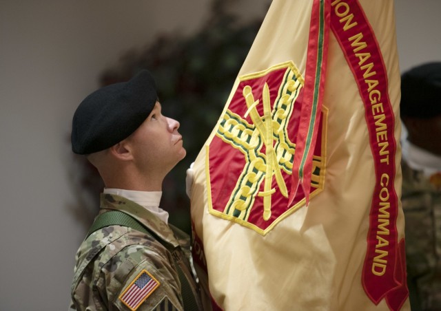 A member of the Headquarters and Headquarters Battalion color guard checks the U.S. Army Garrison - Fort Jackson colors prior to a change of command ceremony June 15 at Victory Hall on post. Col. Ryan Hanson assumed command of Fort Jackson's...