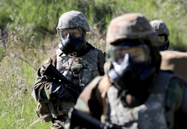 Sgt. Zachery Smith, an Army medic assigned to Tripler Army Medical Center, Honolulu, moves out with members of his team during the Regional Health Command-Pacific Best Leader Competition, Joint Base Lewis-McChord, Wash., June 17, 2021. The Best...