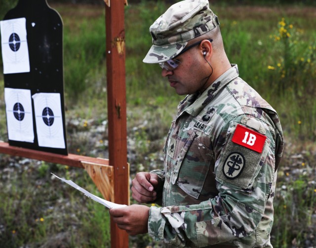 Staff Sgt. Israel Rivera, an Army medic assigned to Desmond Doss Army Health Clinic, Hawaii, checks his zero target during the Regional Health Command-Pacific Best Leader Competition at Joint Base Lewis-McChord, Wash., June 16, 2021. The Best Leader Competition promotes esprit de corps across the Army, while recognizing Soldiers who demonstrate the Army Values and embody the Warrior Ethos. The competition recognizes those Soldiers who possess superb military bearing and communication skills, in-depth knowledge of military subjects, and the ability to perform Soldier and warrior skills at levels above those of their peers. The winners of the competition will represent Regional Health Command-Pacific at the U.S. Army Medical Command Best Leader Competition, July 25-30, in Hawaii.