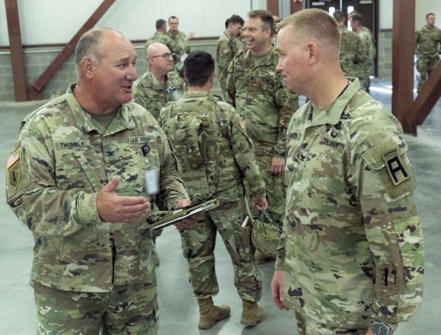 Col. Eric Beaty (right), 177th Armored Brigade commander, speaks with Col. Matthew Twombly, 35th Infantry Division chief of staff, during Warfighter 21-05 at Camp Atterbury, Ind.