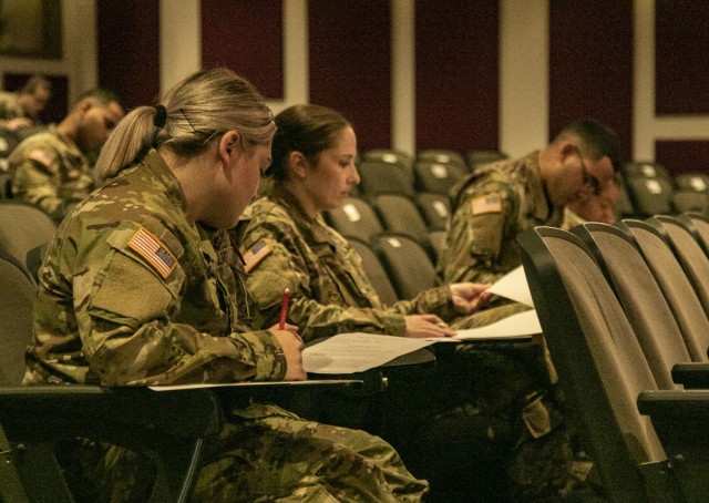 Competitiors in the Regional Health Command - Pacific’s best leader competition complete 50 multiple choice questions, at Joint Base Lewis-McChord, Wash., June 15, 2021. This competition will test Army medical personnel as Soldiers and as medics...