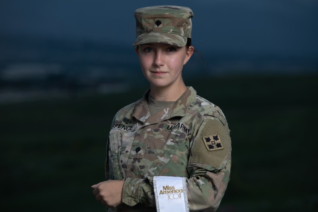 Spc. Maura Spence, a Katy, Texas native and an intelligence analyst assigned to Headquarters and Headquarters Company, 23rd Infantry Regiment, 1st Stryker Brigade Combat Team, 4th Infantry Division, displays her sash after winning first place in the Miss Colorado 2021 pageant, June 8, 2021. Two reasons for Spence’s drive to compete in Miss Colorado and Miss America are to spread awareness for mental health and to keep the memory and dreams of her departed sister alive. (U.S. Army photo by Spc. Matthew Marsilia)