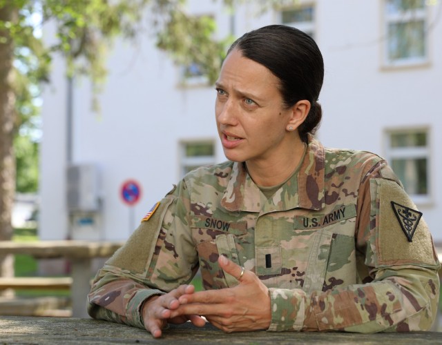 1st Lt. Jenna Snow, an entomologist with 3rd Medical Command (Deployment Support) at Fort Gillem Enclave, GA speaks about her experience during a medical command post exercise, part of Defender Europe 21, on Daenner Kaserne in Kaiserslautern, Germany June 11, 2021. Defender Europe 21 is an annual large-scale U.S. Army Europe and Africa-led joint, multinational exercise designed to build readiness and interoperability between U.S., NATO and partner militaries.  (U.S. Army photo by Sgt. Christopher Stelter)