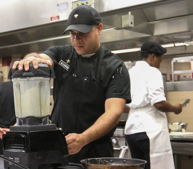 SPC Edwin Alvarado, STB, DSB, 101st Airborne Division (AASLT), preparing a puree for his entree during the 2021 Week of the Eagles culinary competition. This competition gives Soldiers from all career fields the chance to show off their creativity...