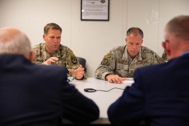 Col. Tobin A. Magsig (left), commander of the U.S. Army Joint Modernization Command, and Col. Ryan Weisiger, Air Force Team Chief on The Joint Staff, discuss Joint Warfighting Assessment 21 during a meeting June 14 on Schofield Barracks, Hawaii. (Photo by SPC Natianna Strachen / 55th Signal Company)