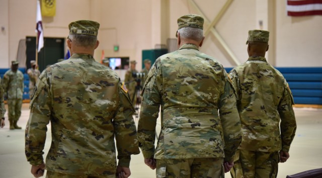 U.S. Army Medical Development and Research Command Commanding General, Brig. Gen. Anthony L. McQueen, stands with Maj. Gen. Michael J. Talley, previous USAMRDC Commanding General and Gen. John M. Murray, Commanding General of the U.S. Army Futures...