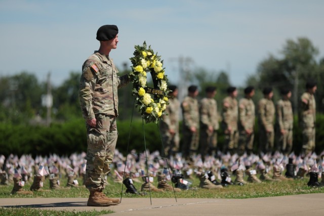 During this event, 101st Airborne Division (Air Assault) soldiers take part in the memorial ceremony, honoring the veterans and fallen Soldiers of the 101st. (Photos by: US Army, Spc. Jordy Harris)