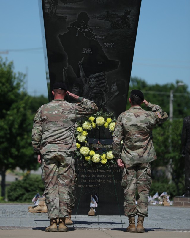 Maj. Gen. JP McGee and Sgt. Maj. Jason Buda Salute the wreath and monument, honoring the legacy of the fallen soldiers and those who were lost. (Photos by: US Army, Spc. Jordy Harris)